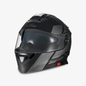 CASCO MOTO GUZZI MODULARE Calotta esterna in resina termoplastica. Bluetooth integrato, consente anche la comunicazione tra pilota e passeggero. Mentoniera apribile. Interni anallergici, removibili e lavabili. Sistema di ritenuta micrometrica. Visiera antigraffio. Visiera parasole integrata a scomparsa. Sistema di ventilazione. Vernice anti raggi UV. Omologazione ECE 22.05.